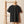 Unisex Bio-T-Shirt in Schwarz mit rot gesticktem Krabbenmotiv auf Holzleiter-Halterung.